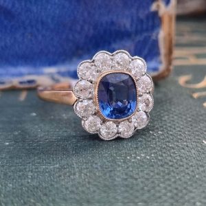 Vintage 1ct Cushion Cut Sapphire and Old Cut Diamond Cluster Engagement Ring in platinum to 18ct yellow gold