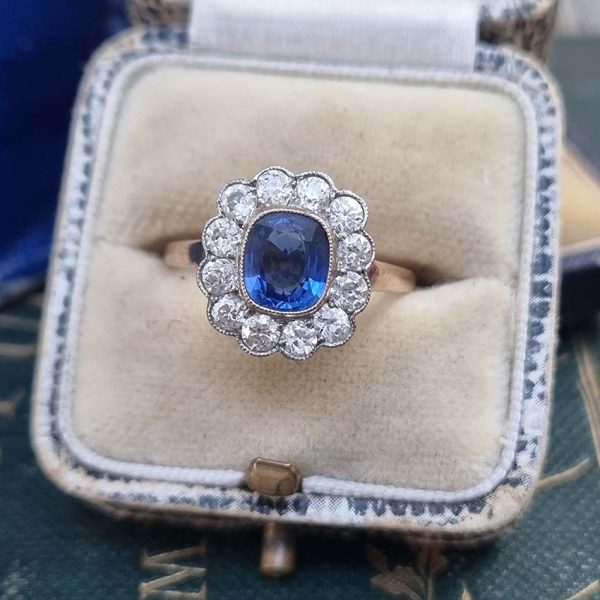 Vintage 1ct Cushion Cut Sapphire and Old Cut Diamond Cluster Engagement Ring in platinum to 18ct yellow gold
