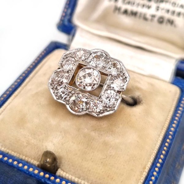 Art Deco 1.5ct Old Cut Diamond Cluster Panel Ring, set with an estimated 1.5 carats of old mine-cut diamonds in 18ct yellow gold to 18ct white gold band