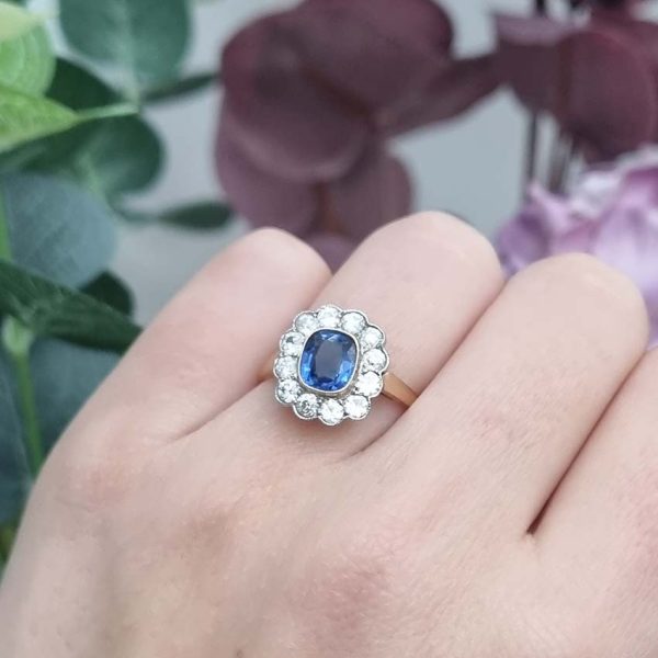 Vintage 1ct Cushion Cut Sapphire and Old Cut Diamond Floral Cluster Engagement Ring in platinum to 18ct yellow gold