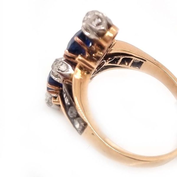 Victorian Antique Sapphire and Diamond Dress Ring, two cushion cut sapphires accented with four old mine-cut diamonds in 18ct yellow gold