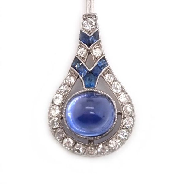 Art Deco Carved Sapphire and Diamond Feather Pin Brooch, sugarloaf cabochon sapphire and diamond cluster base leading to decorative carved sapphire feather top in 18ct white gold and platinum