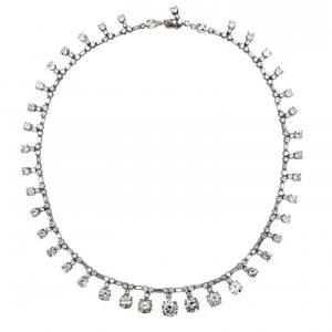 Vintage 1950s French Diamond and Platinum Riviere Necklace, 37.84 carats, graduating drops of round brilliant-cut diamonds on articulating chain of alternating brilliant and baguette-cut diamonds in platinum
