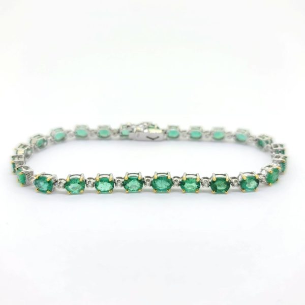 8.14ct Oval Cut Emerald and Diamond Line Tennis Bracelet in 18ct Gold