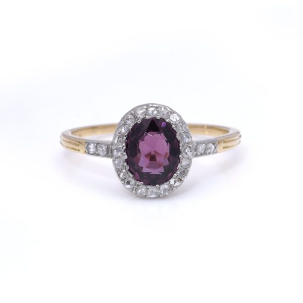 Spinel and diamond cluster ring in gold and platinum.