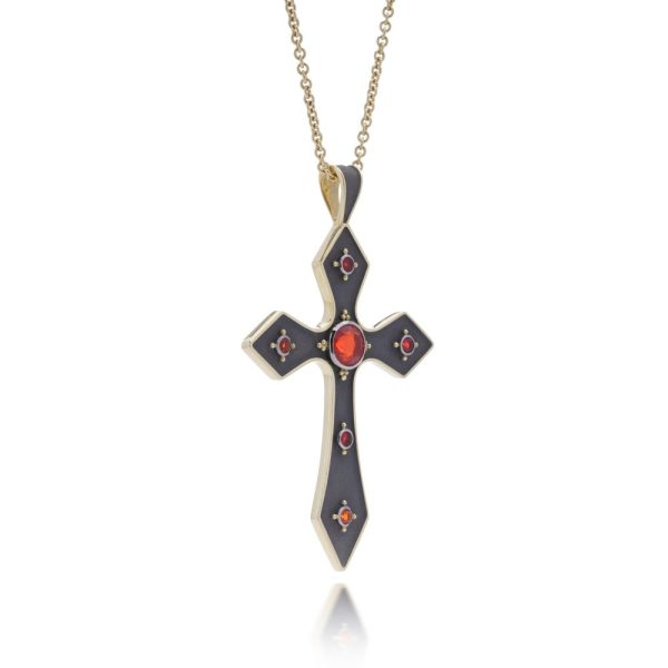 Gold cross pendant featuring vivid fire opals.