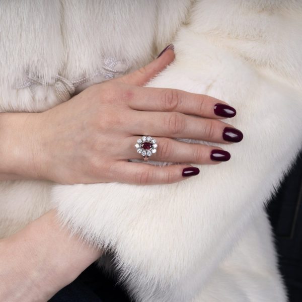 Vintage ruby and diamond cluster ring in gold.