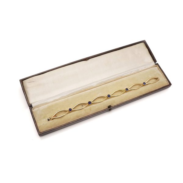 Faberge sapphire link bracelet in gold.