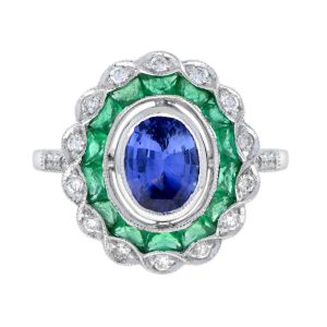 1.50ct Ceylon Sapphire with Emerald and Diamond Cluster Engagement Ring, 1.50ct oval cut Ceylon Sapphire surrounded by emerald halo and outer border of sparkling diamonds in 18ct white gold