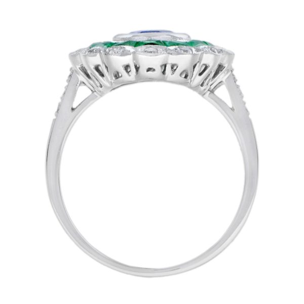 1.50ct Ceylon Sapphire with Emerald and Diamond Cluster Engagement Ring, 1.50ct oval cut Ceylon Sapphire surrounded by emerald halo and outer border of sparkling diamonds in 18ct white gold