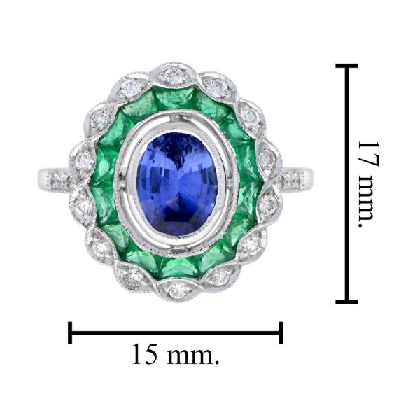 1.50ct Ceylon Sapphire with Emerald and Diamond Cluster Engagement Ring, 1.50ct oval cut Ceylon Sapphire surrounded by emerald halo and outer border of sparkling diamonds in 18ct white gold