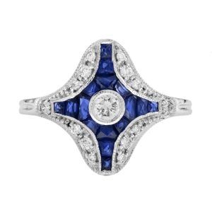 Diamond and Sapphire Navette Cluster Plaque Ring, central sparkling diamond surrounded by calibre French-cut blue sapphires within outer diamond border in 14ct white gold