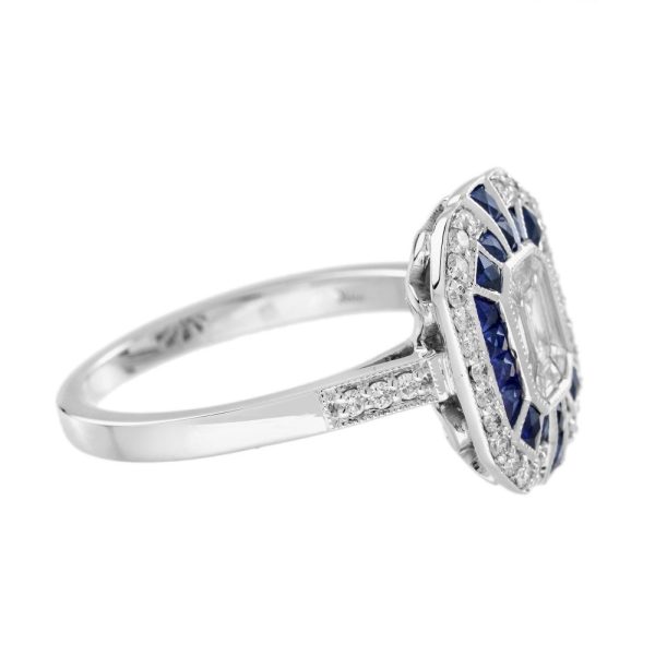 Diamond and Sapphire Cluster Engagement Ring in 18ct White Gold, centre composed of nine separate diamond illusion set into larger emerald-cut diamond design surrounded by sapphire halo and outer diamond border