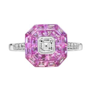 Asscher Cut Diamond and Pink Sapphire Engagement Ring, 0.30ct Asscher-cut diamond is surrounded by invisible set vibrant pink sapphires creating solid solitaire design in 18ct white gold with diamond-set shoulders