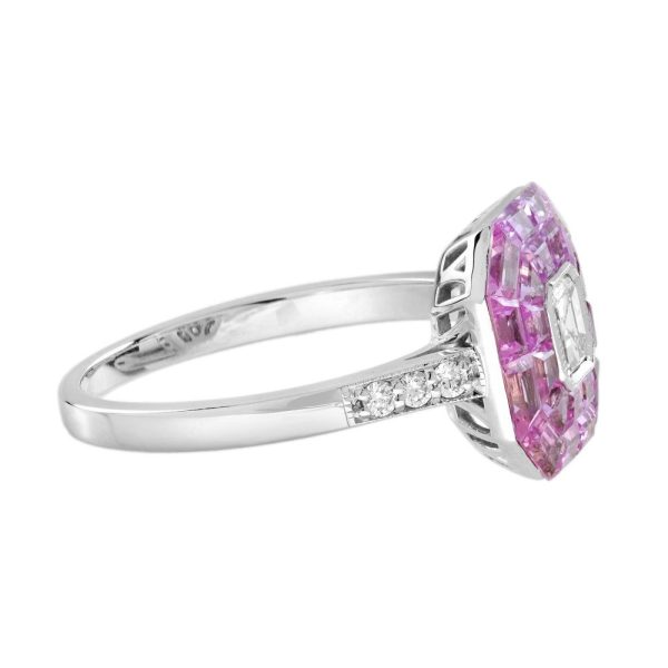 Asscher Cut Diamond and Pink Sapphire Engagement Ring, 0.30ct Asscher-cut diamond is surrounded by invisible set vibrant pink sapphires creating solid solitaire design in 18ct white gold with diamond-set shoulders