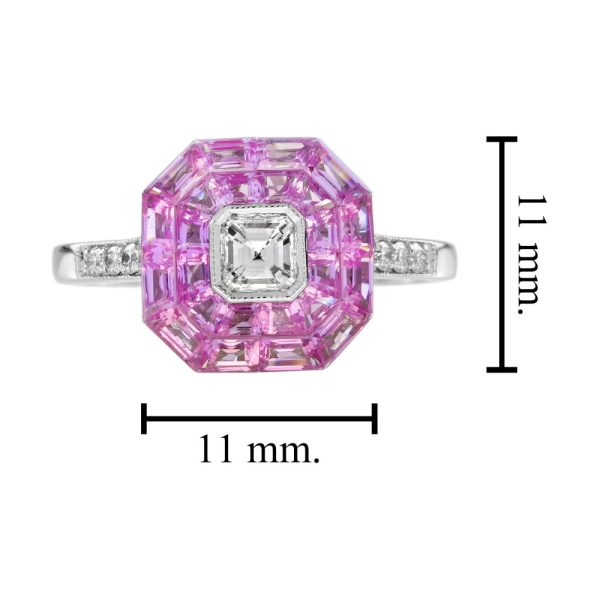 Asscher Cut Diamond and Pink Sapphire Engagement Ring, 0.30ct Asscher-cut diamond is surrounded by invisible set vibrant pink sapphires creating solid solitaire design in 18ct white gold with diamond-set shoulders