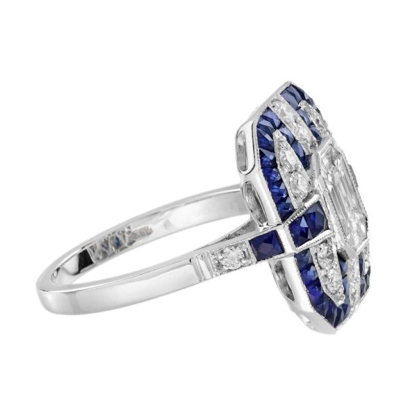 Contemporary Diamond and Sapphire Cluster Plaque Ring, Nine diamond illusion set diamonds form the emerald-shaped centre with diamond and geometric sapphire border in 18ct white gold