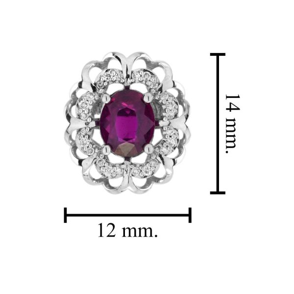 2ct Ruby and Diamond Flower Cluster Stud Earrings, oval red rubies within diamond halo surround and outer gold floral design border in 14ct white gold