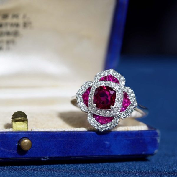 Certified 1ct Natural Ruby and Diamond Flower Cluster Engagement Ring, 1.02ct natural cushion-shaped ruby surrounded by ruby petals with sparkling diamond borders in 14ct white gold