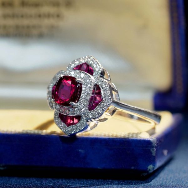 Certified 1ct Natural Ruby and Diamond Flower Cluster Engagement Ring, 1.02ct natural cushion-shaped ruby surrounded by ruby petals with sparkling diamond borders in 14ct white gold