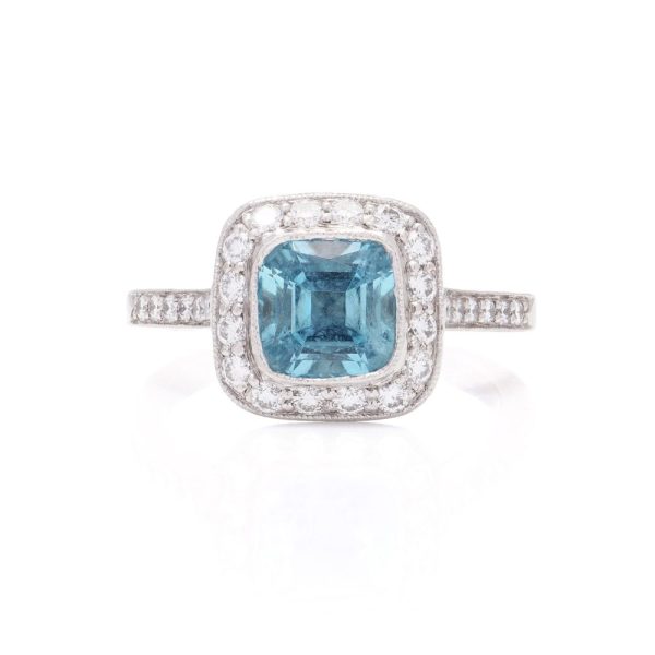 Aquamarine and diamond engagement ring in platinum.