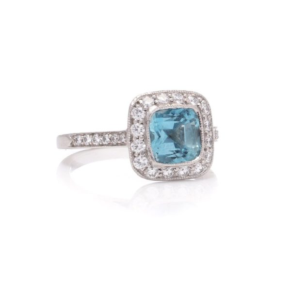 Aquamarine and diamond engagement ring in platinum.