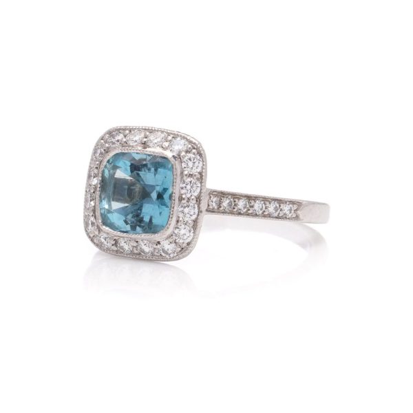 Aquamarine and diamond engagement ring in platinum.