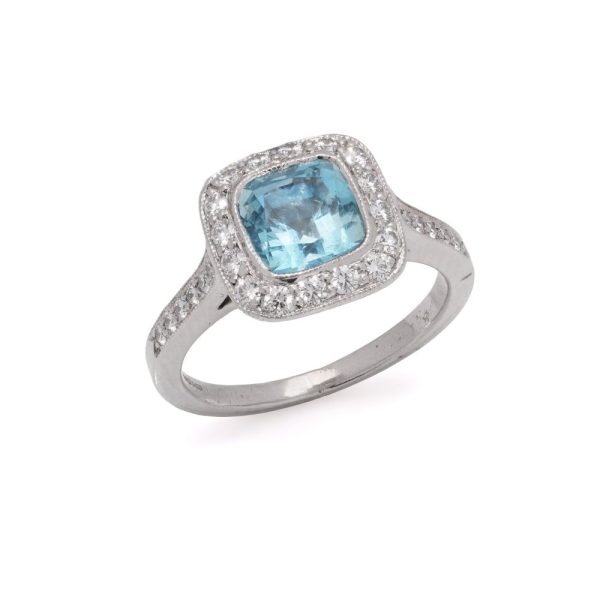 Aquamarine and diamond engagement ring in platinum.