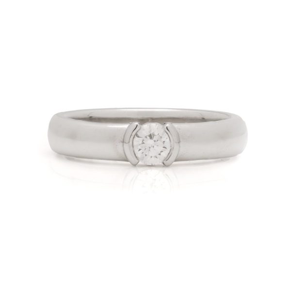 Tiffany and Co Etoile 0.30ct Diamond Solitaire Engagement Ring in Platinum, Tiffany & Co. Etoile sleek polished Platinum band with single stone round brilliant-cut diamond
