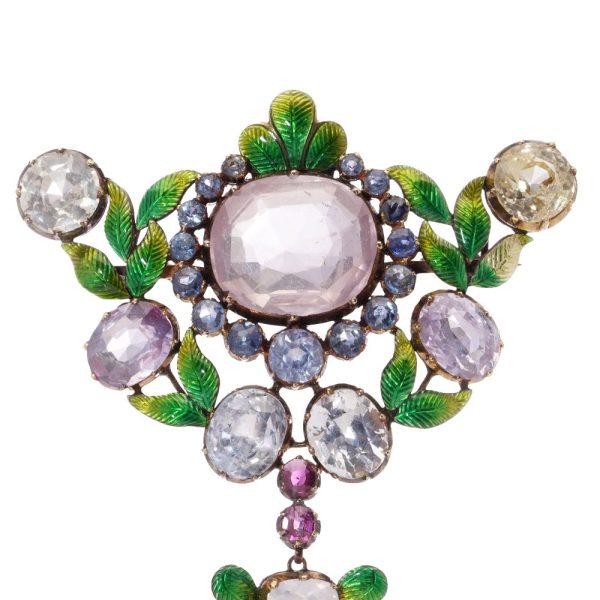 Victorian gemstone and enamel brooch in gold.
