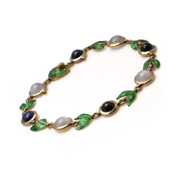Victorian gold bracelet with enamel, sapphires and moonstones.