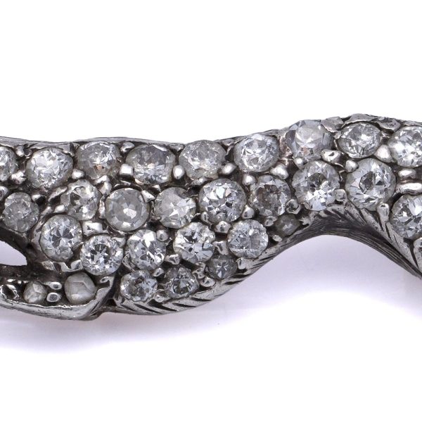 Antique gold and silver greyhound brooch with diamonds and ruby.
