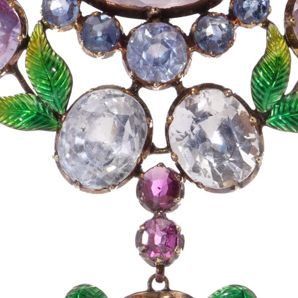 Victorian gemstone and enamel brooch in gold.