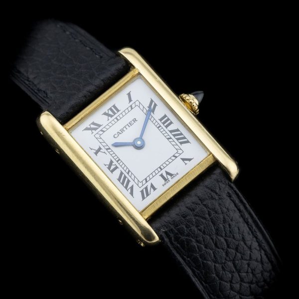 Vintage Cartier Tank Louis Cartier 18ct Yellow Gold Small Model Paris Manual Watch with Cartier Service Papers Paris signed case, Circa 1970s