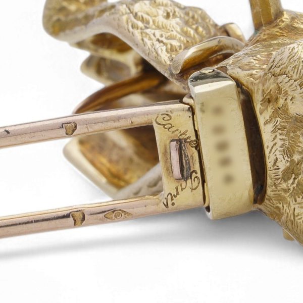 Vintage Cartier schnauzer brooch in yellow gold.
