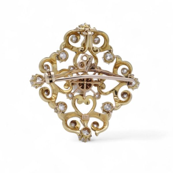 Victorian diamond and pearl pendant and brooch in gold.