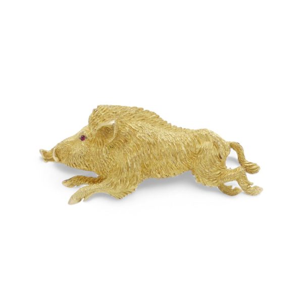 Gold running wild boar brooch.