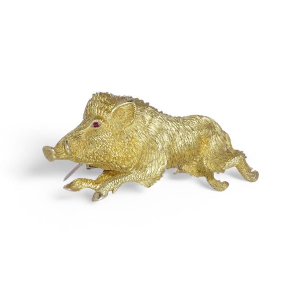Gold running wild boar brooch.