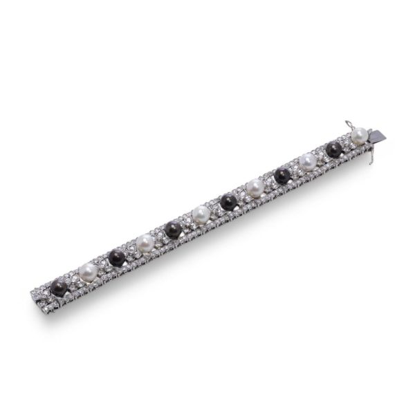Black and white pearl and diamond bracelet in platinum