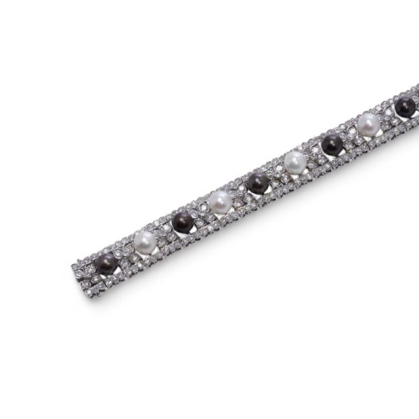 Black and white pearl and diamond bracelet in platinum