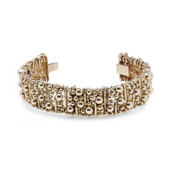 Van Cleef & Arpels gold bracelet watch.