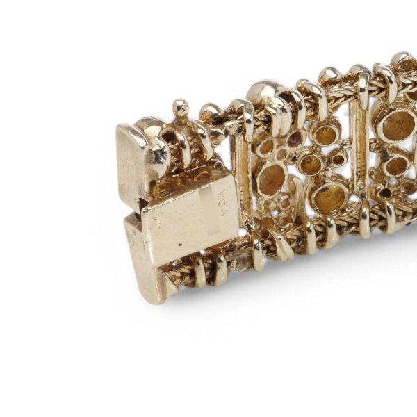 Van Cleef & Arpels gold bracelet watch.