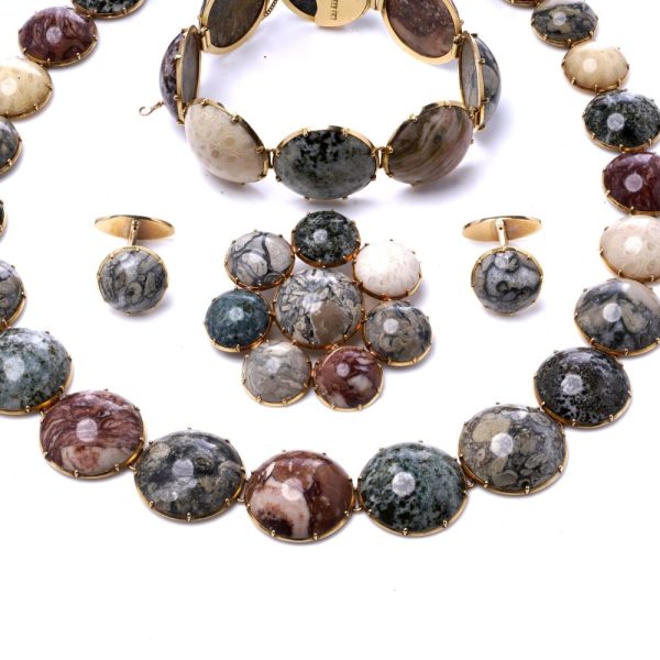 Swedish jewellery set with gemstones in gold.