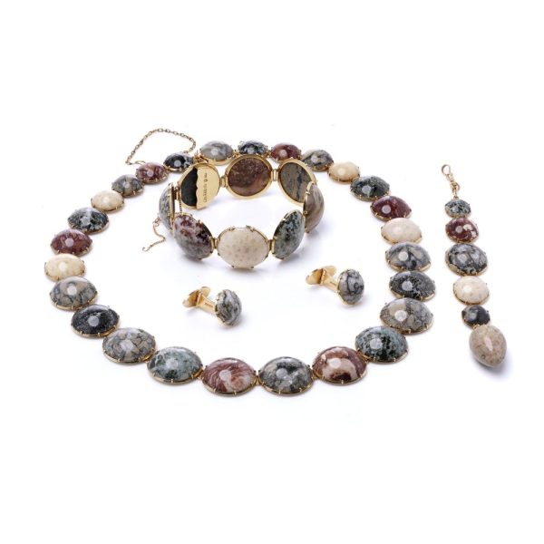 Swedish jewellery set with gemstones in gold.