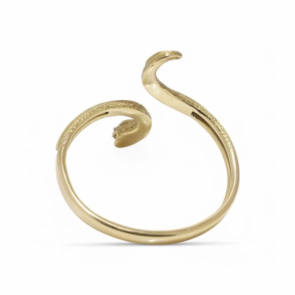 Ilias Lalaounis gold snake bangle.