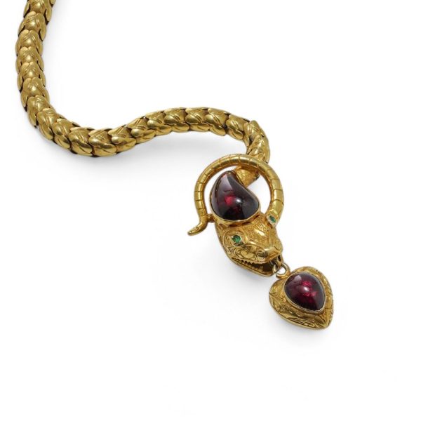 Victorian snake necklace with garnets and emeralds in gold.