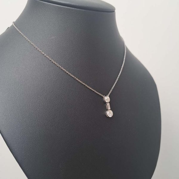 Antique Art Deco 1.35ct Old Cut Diamond Pendant Necklace in Platinum, 0.50ct old mine-cut, 0.15ct baguette-cut and 0.70ct old European transitional diamond