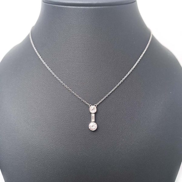 Antique Art Deco 1.35ct Old Cut Diamond Pendant Necklace in Platinum, 0.50ct old mine-cut, 0.15ct baguette-cut and 0.70ct old European transitional diamond