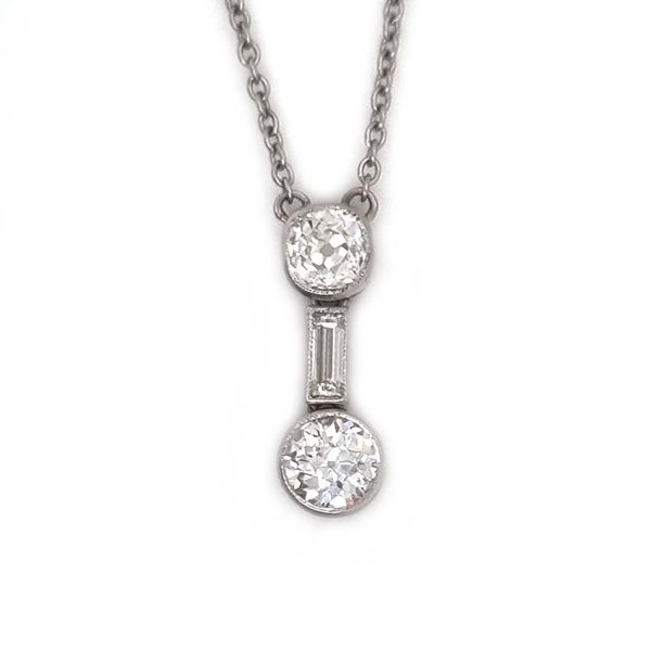 Antique Art Deco 1.35ct Old Cut Diamond Pendant Necklace in Platinum, 0.50ct old mine-cut, 0.15ct baguette-cut and 0.70ct old European transitional diamond