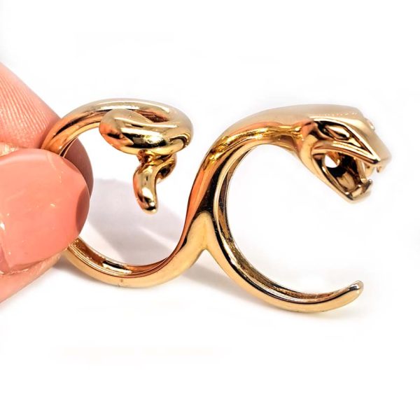 Boucheron Gold Double Finger Snake Ring, 18ct yellow gold snake worn over two fingers. Signed and numbered B25539